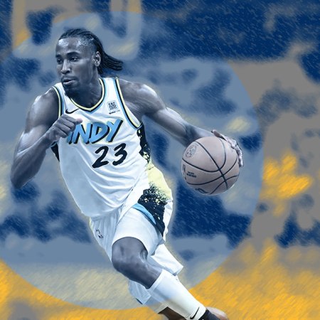 Aaron Nesmith drives the ball to the basket.